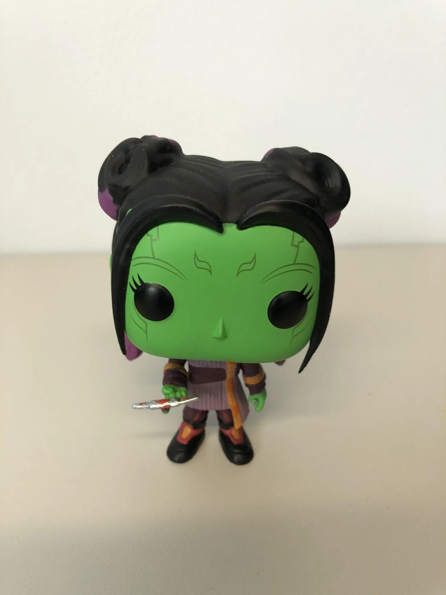 Green Superhero Figurine